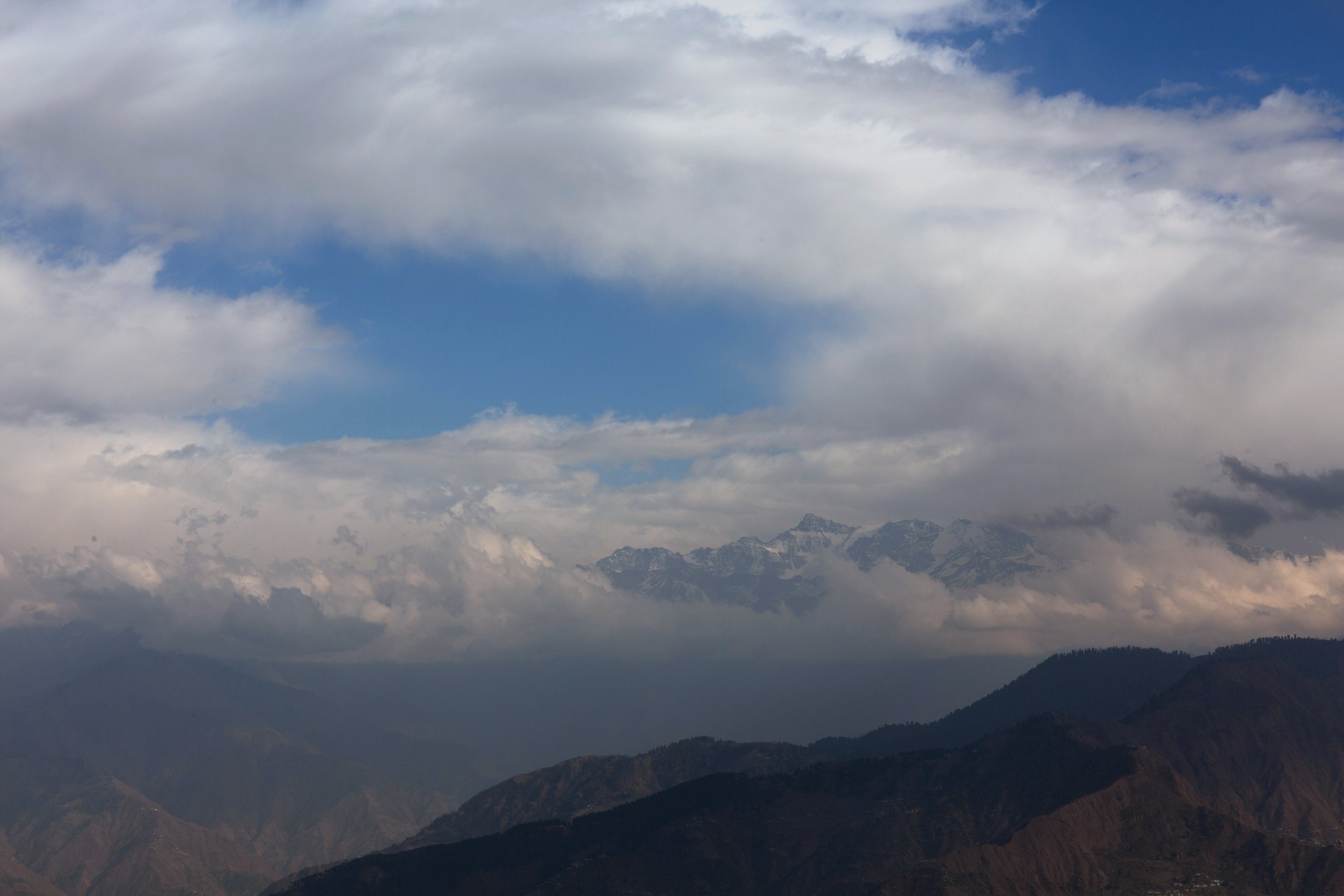 Clouds spill into the valley. â€” Himachal Pradesh Â· Nov 2015